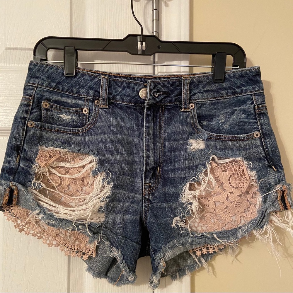 Distressed denim shorts